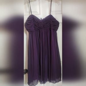 Formal knee length plum colored dress. Size 22 worn twice
